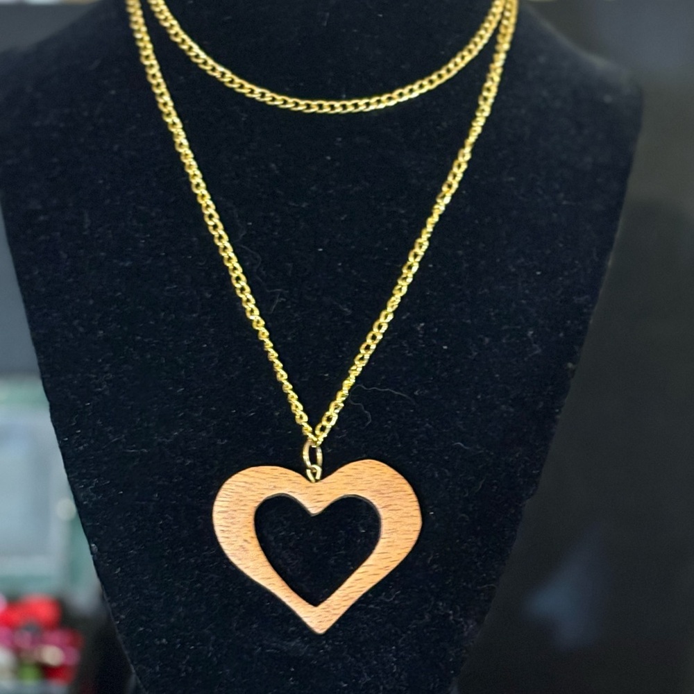 Wooden heart pendant on a faux gold chain, beautiful nonetheless!!